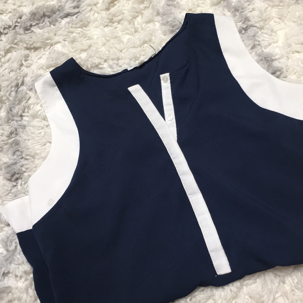 Blue and white sleeveless shirt - medium